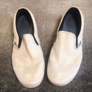 White slip on Vans